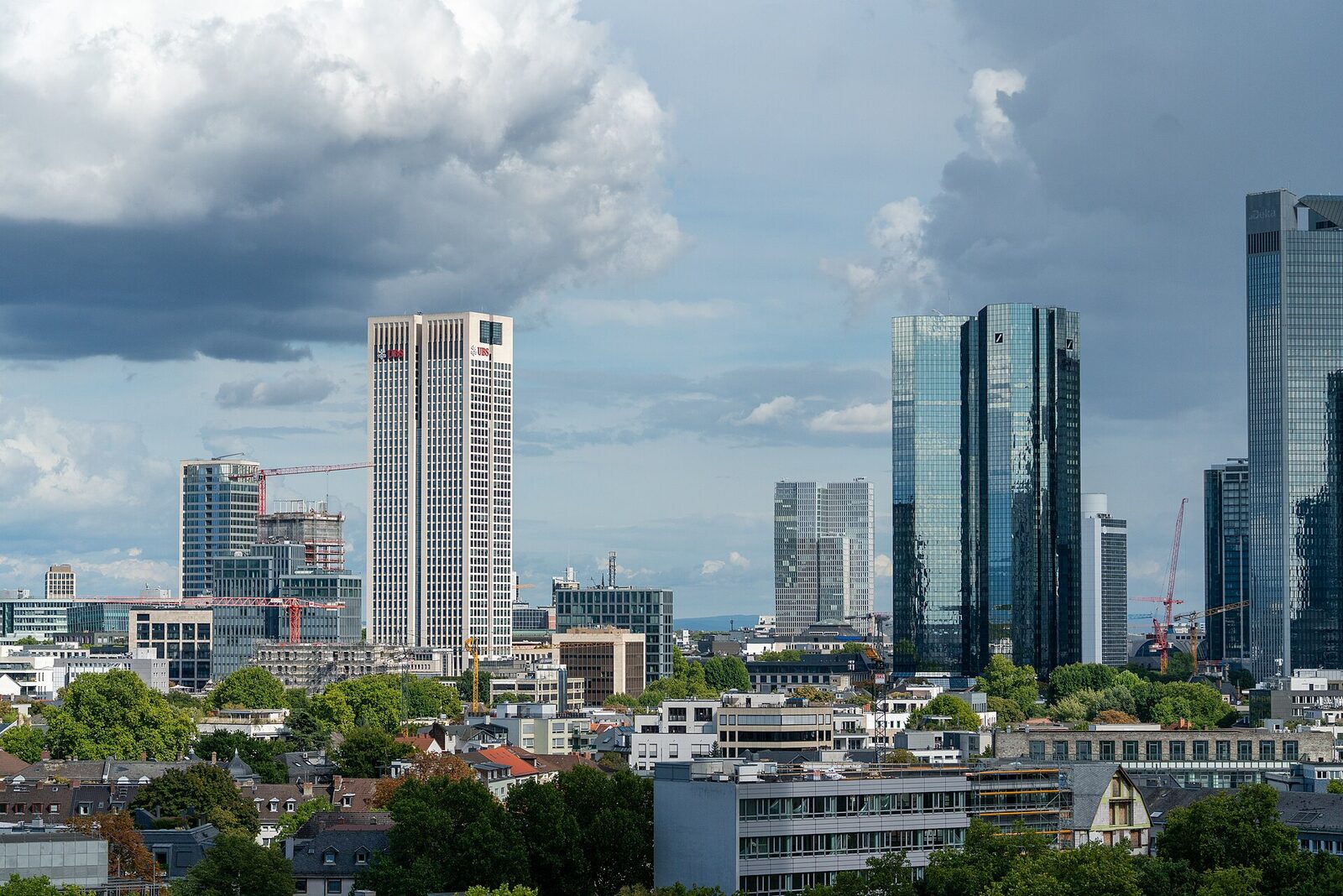 Frankfurt banking skyline under summer clouds